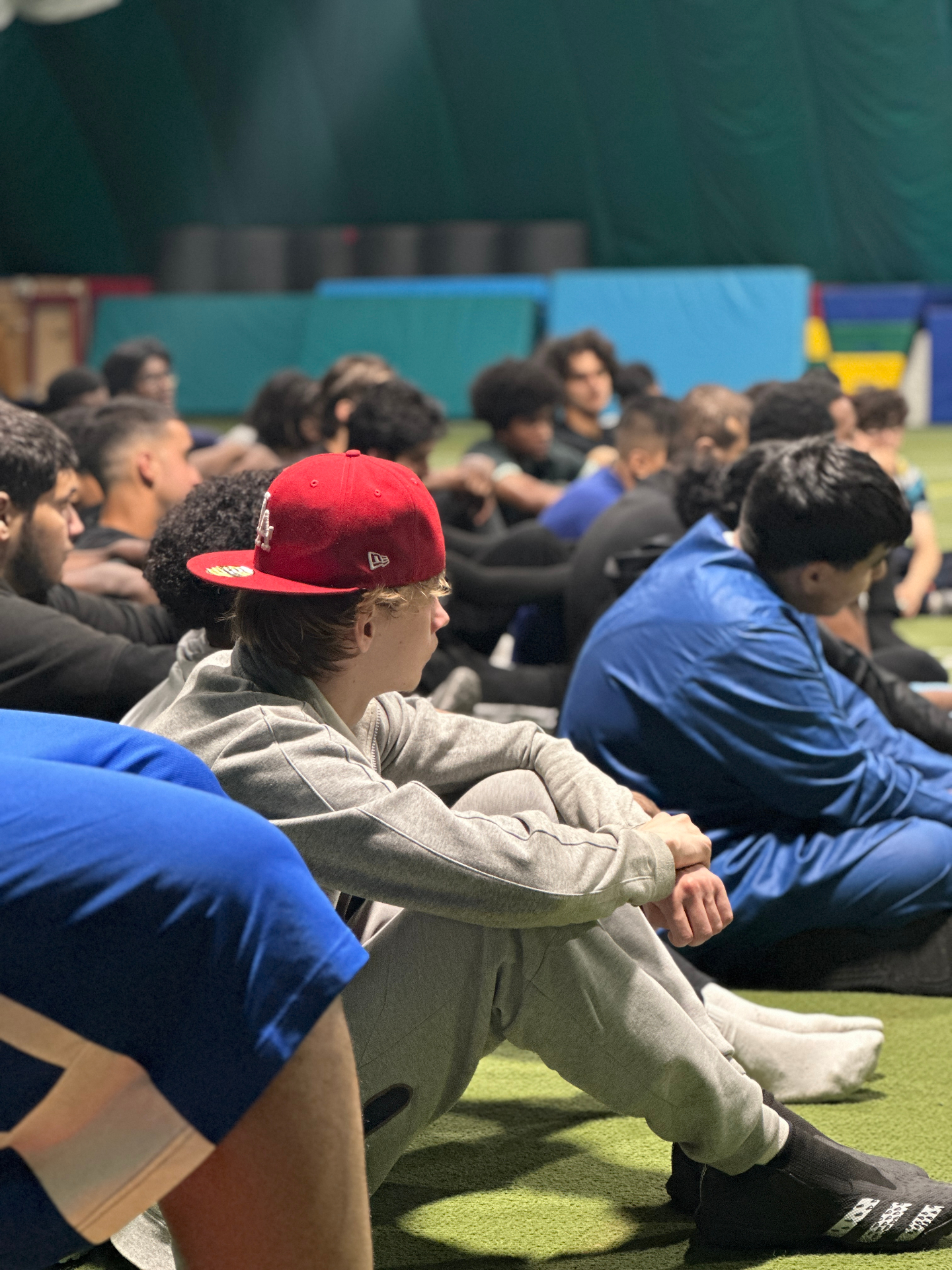 Young people in a circle at Al-Bayaan